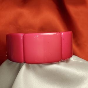 Pink  stretchy plastic bracelet ( lucite?)